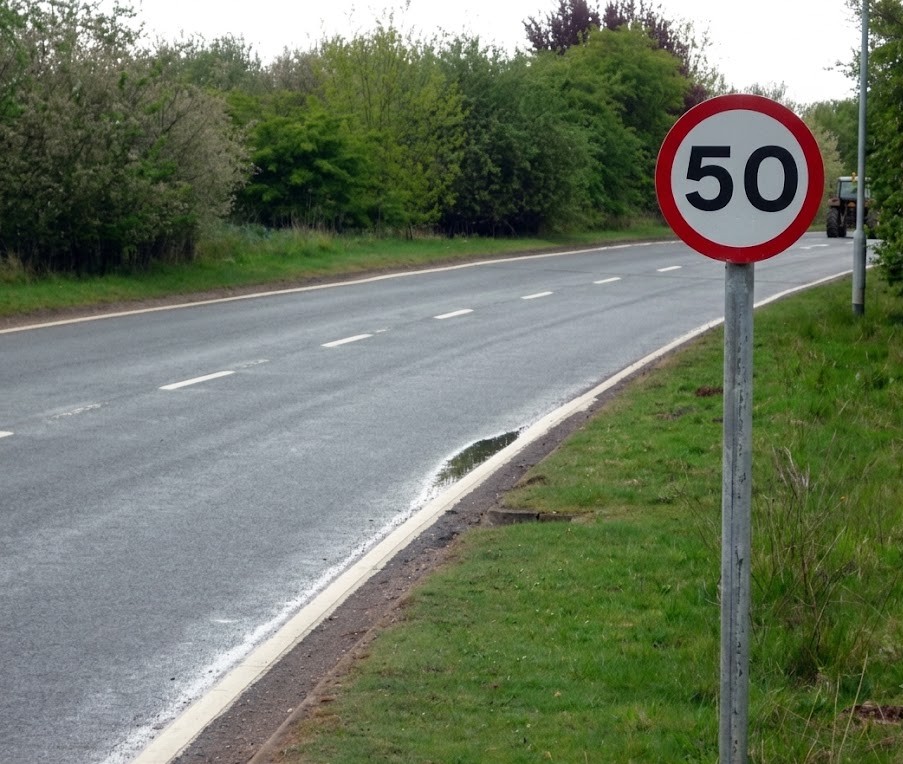 Spanish speed limit signs, for example 50 km/h urban and 120 km/h motorway
