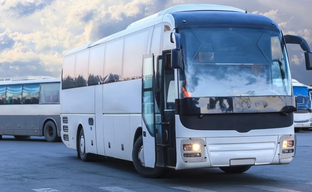 Question image: What is the maximum speed for a bus with no seatbelts or standing passengers on