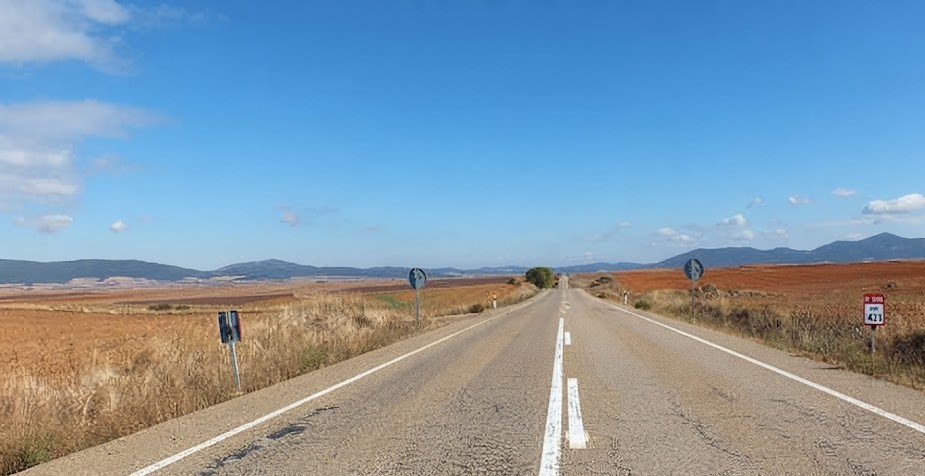 Question image: Does a paved road have priority over an unpaved road?