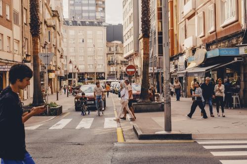 Question image: A driver turns into another road and pedestrians are already crossing. What must