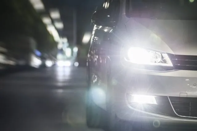 Question image: Why is it important to keep the headlights clean and correctly adjusted?