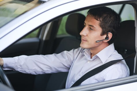 Question image: How many points are lost for driving while wearing headphones connected to a mob
