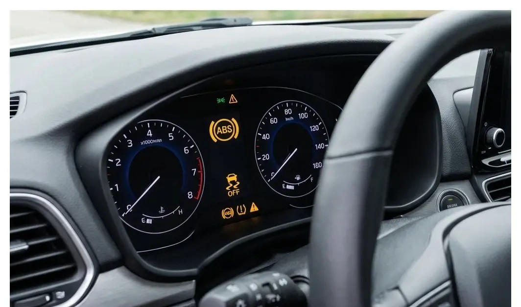 Question image: In an emergency stop with a vehicle fitted with ABS, you should: