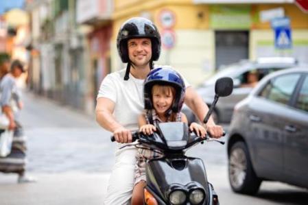 Question image: From what age may a child travel as a passenger on a motorcycle, accompanied and