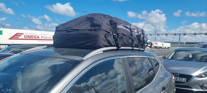 Question image: As a general rule, may the load project laterally beyond the width of the vehicl