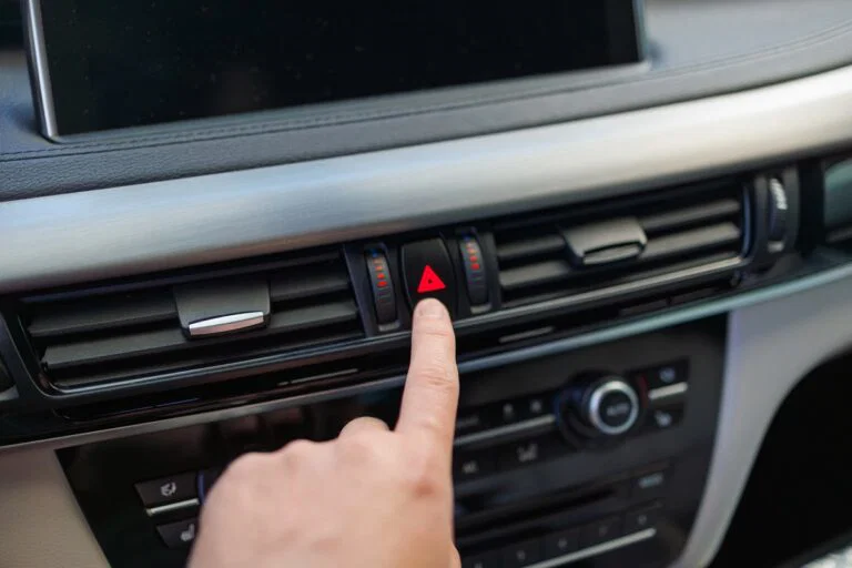 Question image: In which of these situations must the hazard warning lights be used?