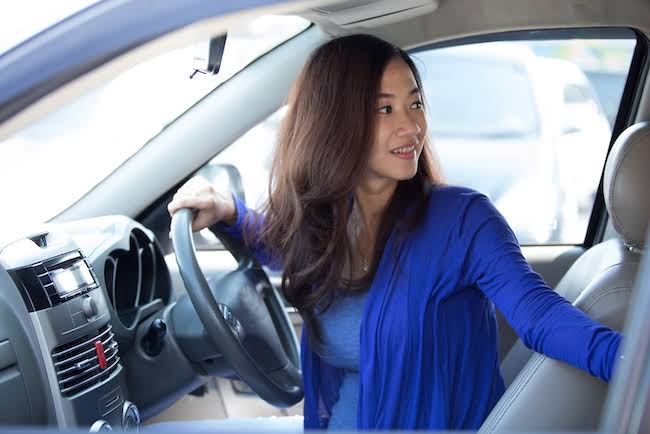 Question image: In which of these situations is the driver exempt from wearing the seat belt?