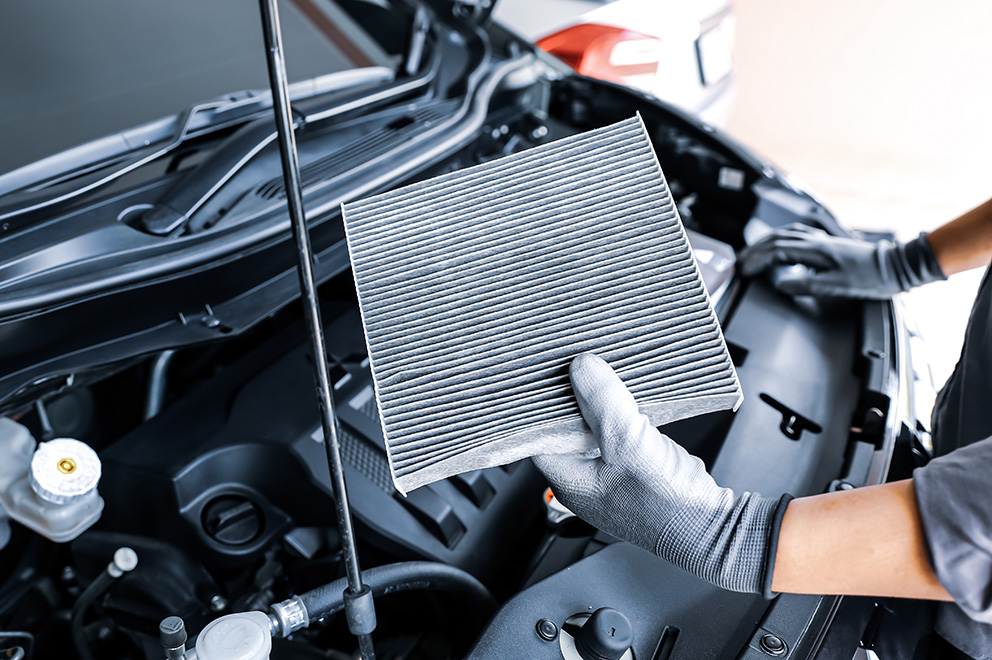 Question image: What is the function of the engine air filter?