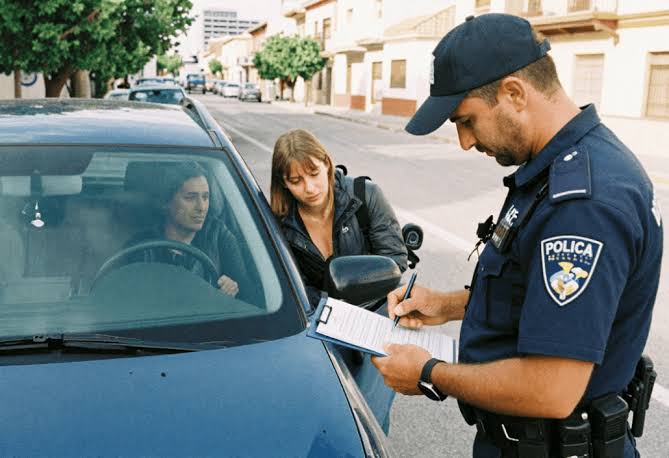 Question image: What is the immediate consequence of driving an uninsured vehicle if stopped by