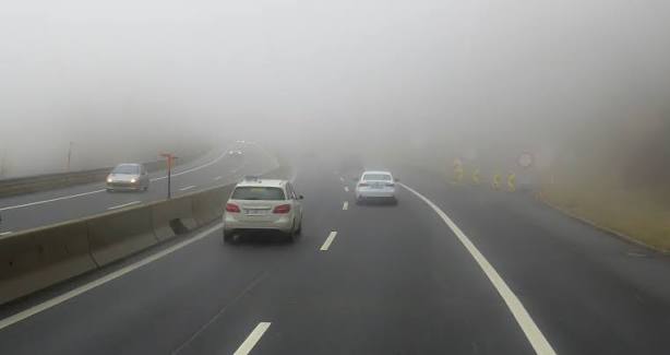 Question image: With visibility limited by fog, which lane is preferable on a multi-lane road?