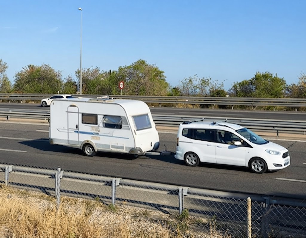 Question image: What is the maximum speed for trucks and vehicles with trailers on motorways?