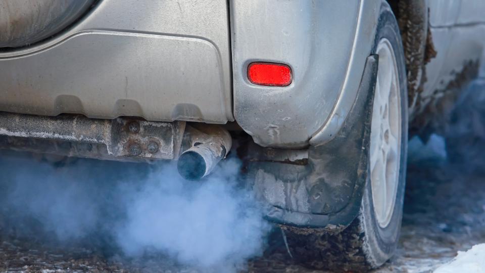 Question image: Bluish-white smoke comes from the exhaust pipe. What does this normally indicate