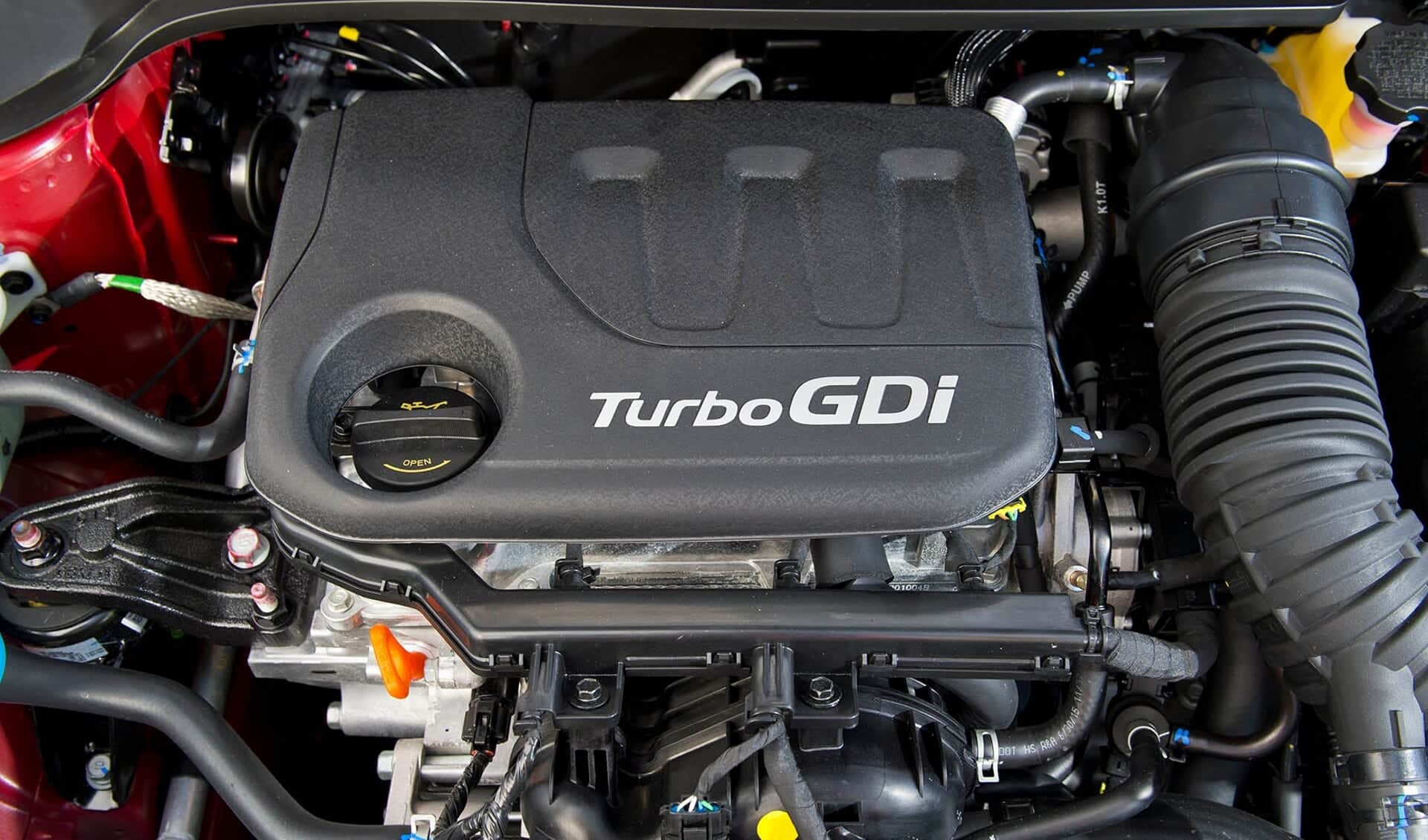 Question image: In a petrol engine, which component generates the spark that ignites the air-fue